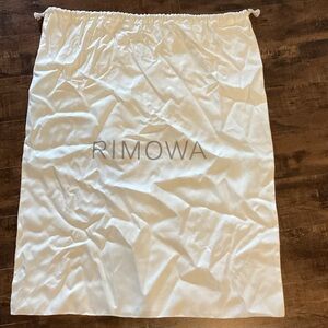 RIMOWA White Travel Dust Bag New without tags. Never used.